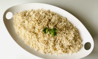 Fragrant rice with herbs and butter finish.