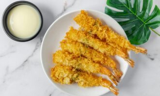 A rich mix of prawns, fish, and calamari served to share.